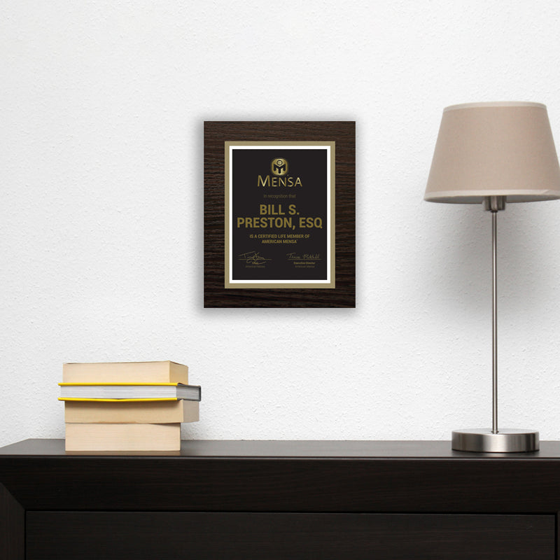 photo of vertical member plaque mounted on wall.