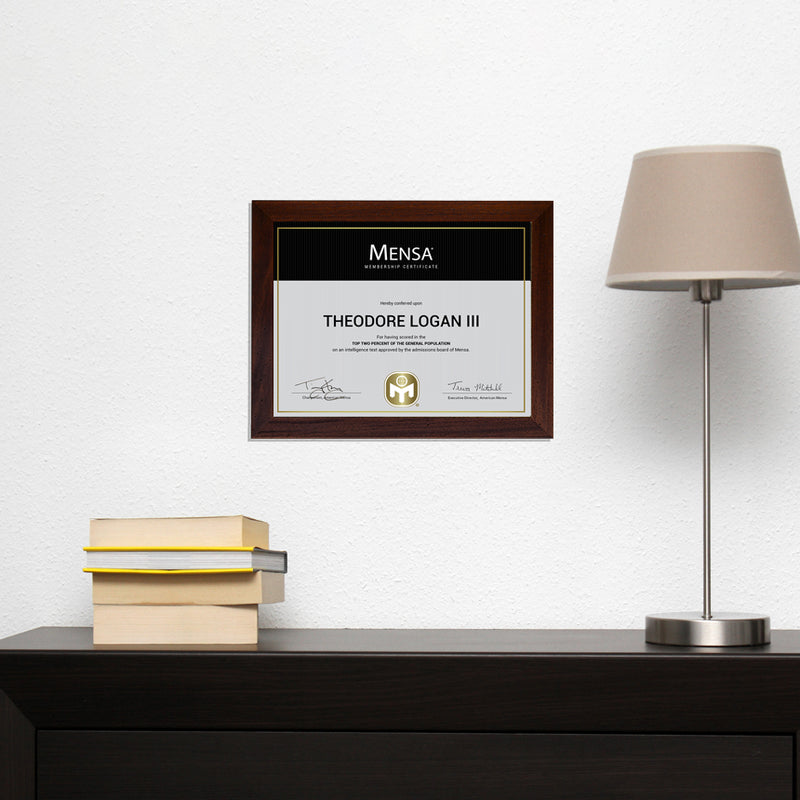 photo of certificate mensa membership certificate mounted on wall.