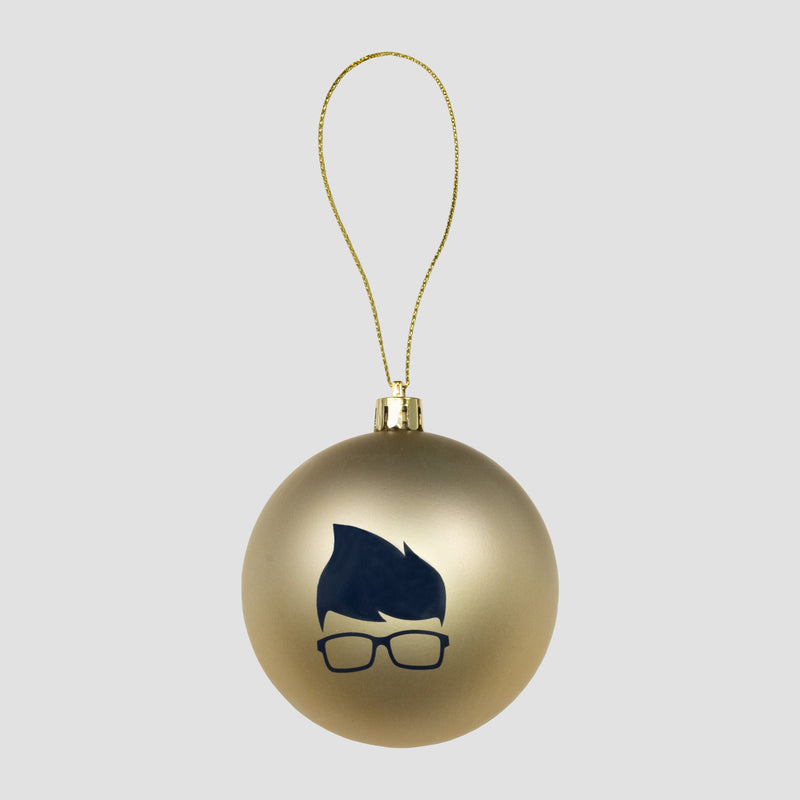 Gold Holiday Ornament with Glasses and Hair graphic