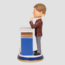 side view of Ken Jennings Bobblehead at Jeopardy Desk