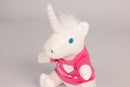 Closeup of White Unicorn stuffed animal wearing pink shirt with white text "I Heart Mensa"