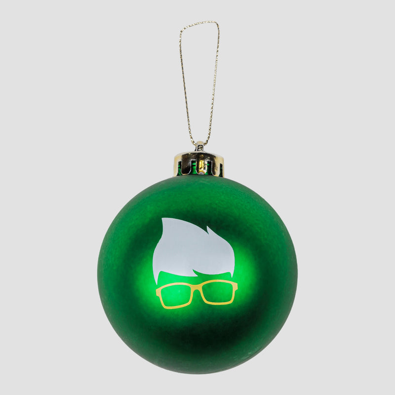 Green ornament with white and yellow Hair and Glasses on side