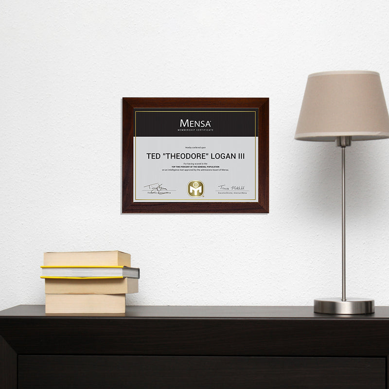 photo of certificate holder in mahogany mounted on wall.
