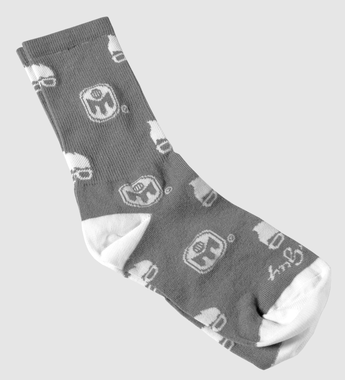 photo of grey socks with mensa hair and glasses logo and mensa m logo in white.